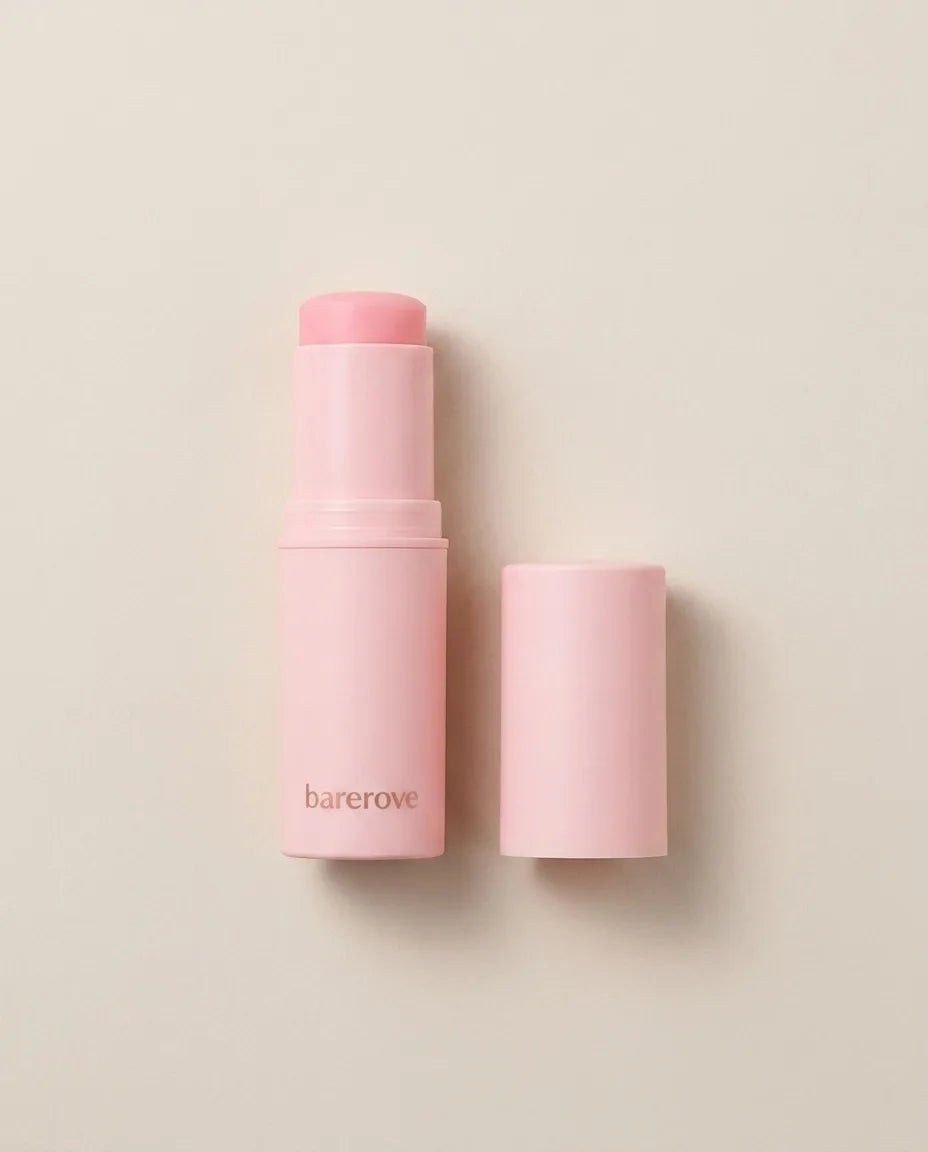 The uncapped stick showing the pink balm bullet