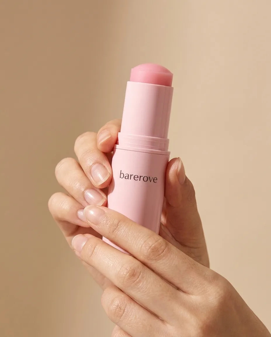 Twisting up the pink balm stick